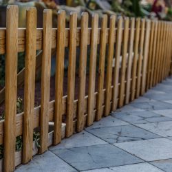 Wooden fence surrounding a manger Wooden fence surrounding a large manger